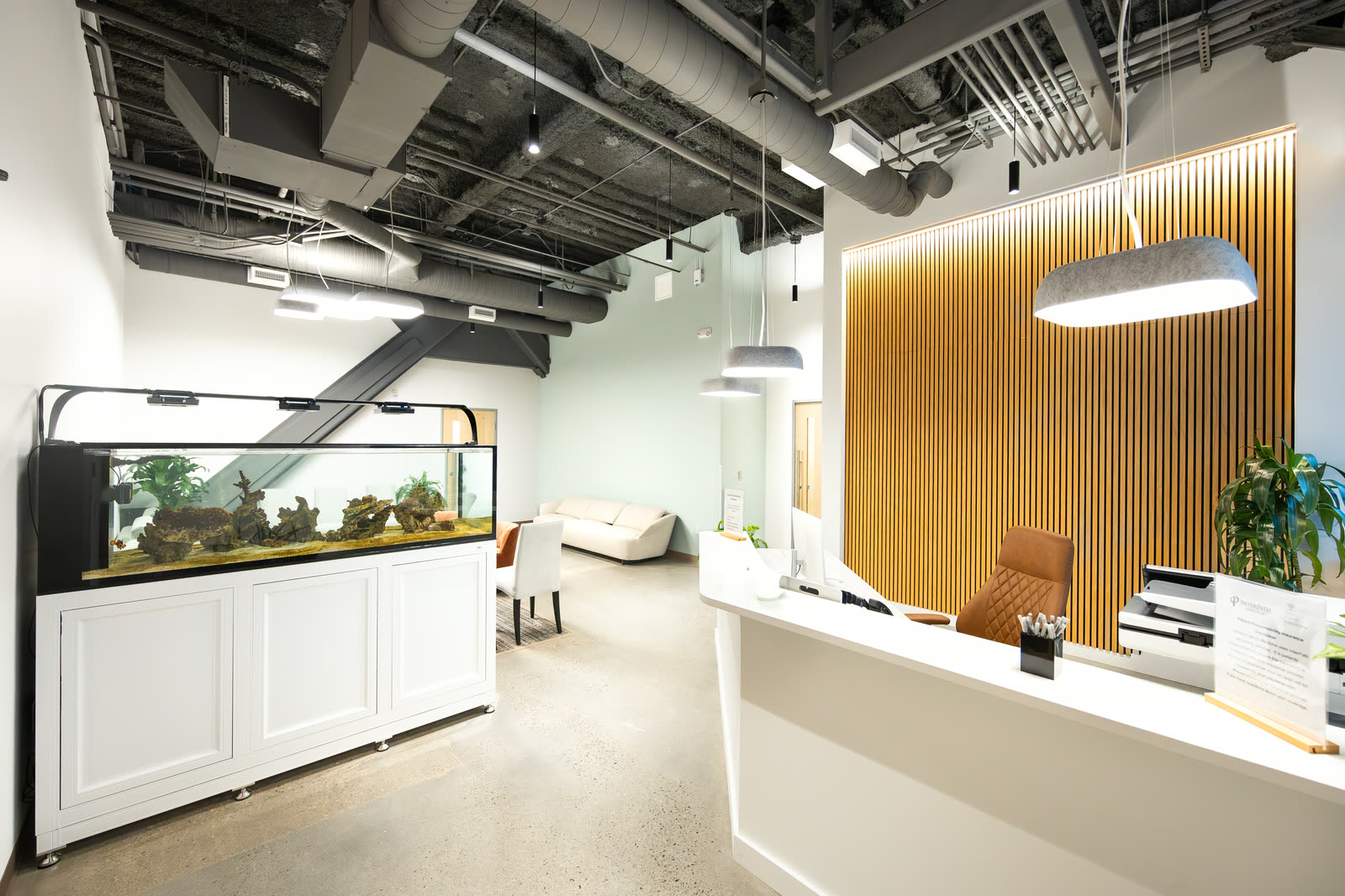 Reception desk and waiting area at Orenco Family Medicine in Hillsboro, built out by Modern Northwest